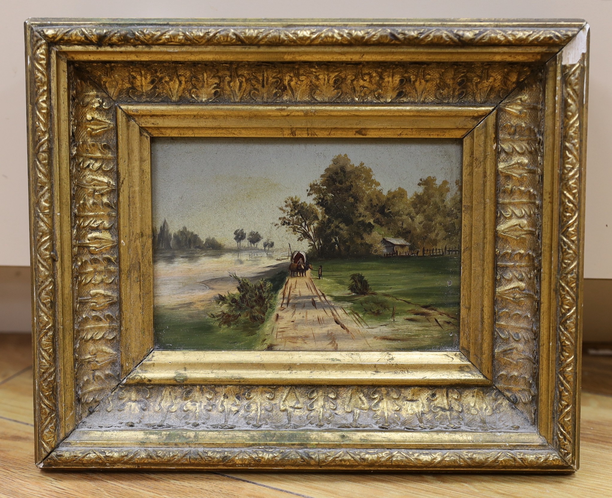 19th century Continental School, oil on card, Cart on a riverside lane, 10 x 15cm